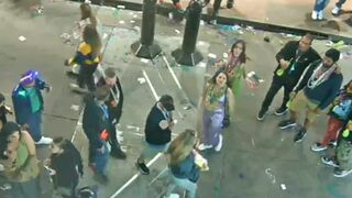 woman flashing boobs for beads at mardi gras on earthcam