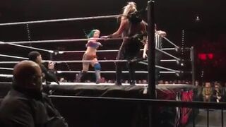 Asuka stinkfaces Dana Brooke